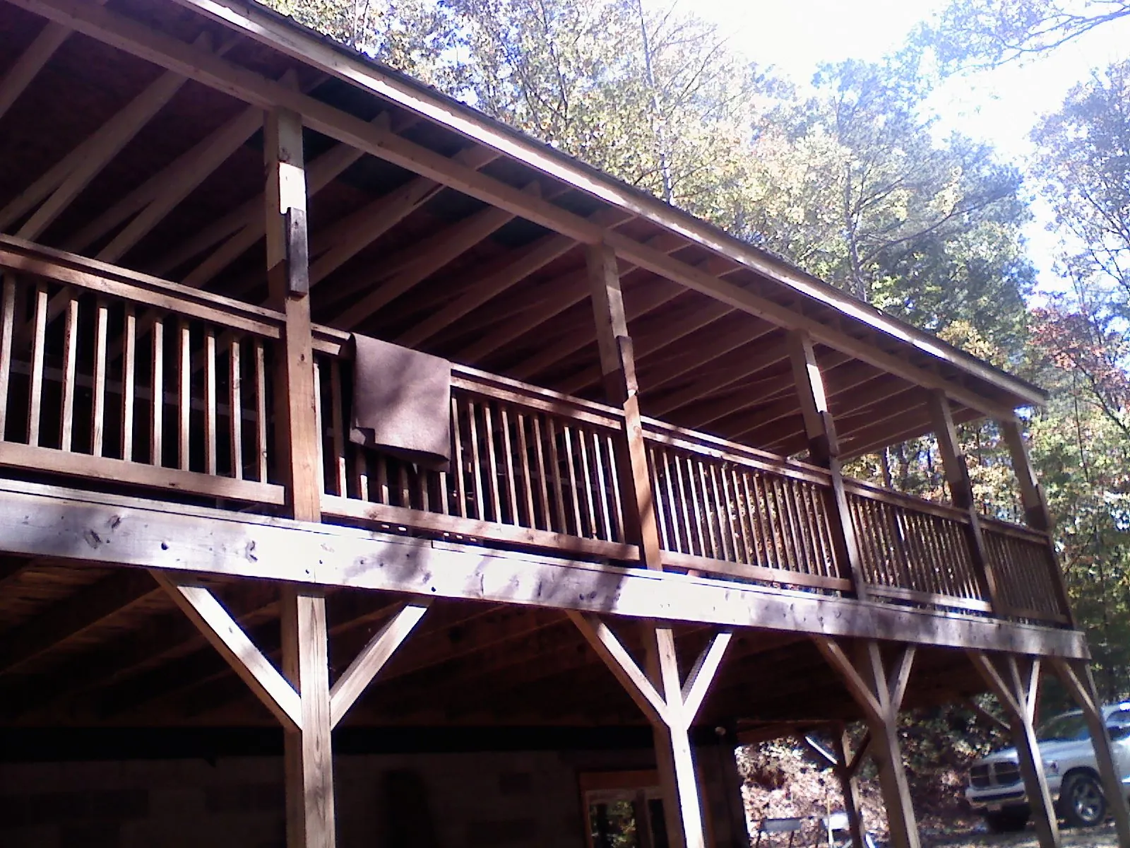 Timber framing under a new elevated porch and deck — Roof Leak Repair in Newhall by Roofing Brothers